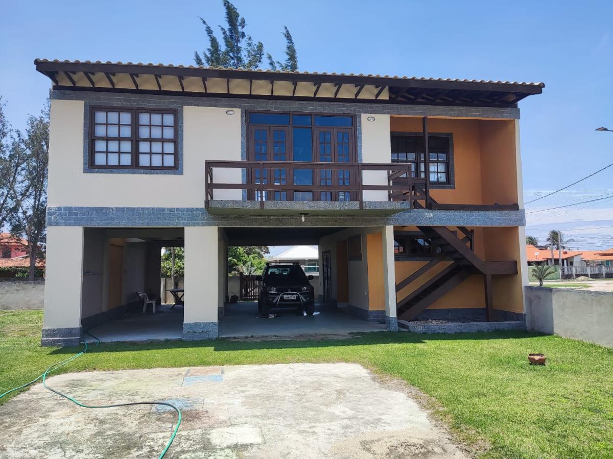 Casa com piscina no condomínio Recanto das Orquídeas em Praia Seca